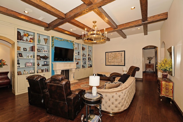 living room with dark hardwood / wood-style flooring, beam ceiling, and an inviting chandelier