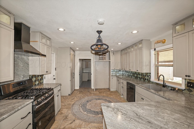 kitchen featuring pendant lighting, sink, double oven range, light stone counters, and wall chimney range hood