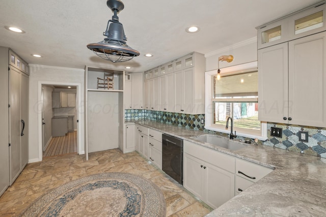 kitchen with hanging light fixtures, dishwasher, light stone countertops, and white cabinets