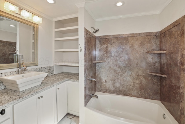 bathroom with vanity, crown molding, built in shelves, and shower / bath combination