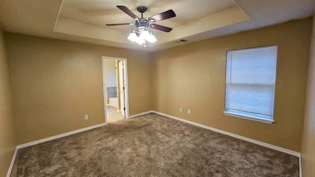4207 Ross St, Amarillo, TX 79118 - unfurnished room with carpet flooring, a raised ceiling, and ceiling fan