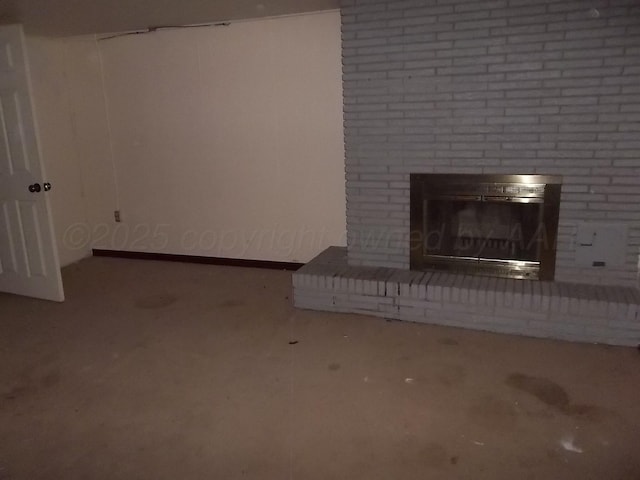 unfurnished living room featuring a fireplace