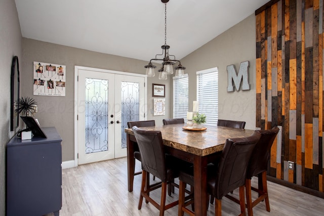 3506 Stromberg Pl, Amarillo, TX 79121 - dining room with light wood finished floors, a chandelier, lofted ceiling, and french doors