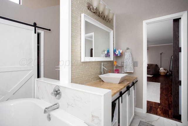 3506 Stromberg Pl, Amarillo, TX 79121 - full bathroom featuring marble finish flooring, a bathtub, vanity, and tasteful backsplash