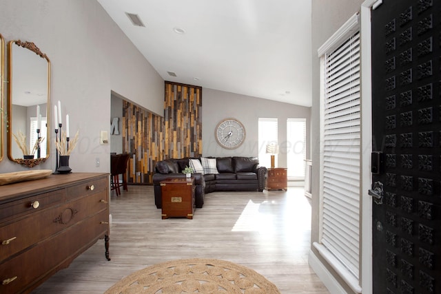 3506 Stromberg Pl, Amarillo, TX 79121 - living room with vaulted ceiling and light wood-style flooring