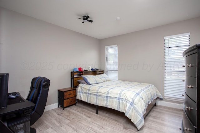 3506 Stromberg Pl, Amarillo, TX 79121 - bedroom with light wood finished floors and multiple windows