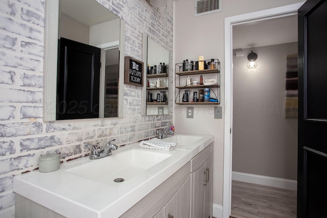 3506 Stromberg Pl, Amarillo, TX 79121 - bathroom featuring vanity and wood finished floors