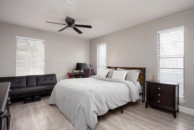 3506 Stromberg Pl, Amarillo, TX 79121 - bedroom with light wood finished floors and a ceiling fan