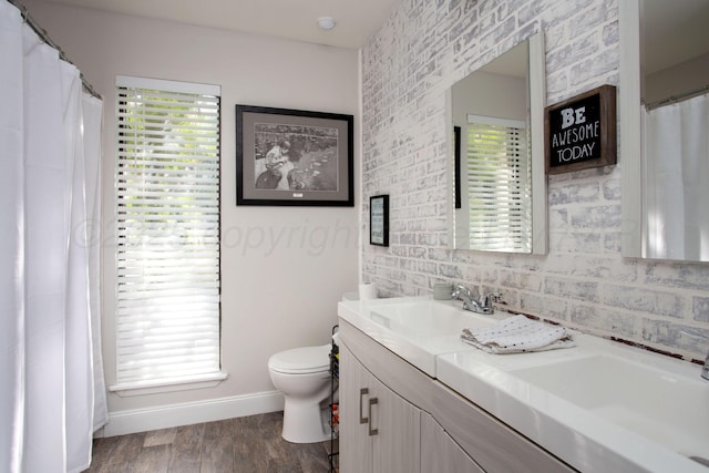 3506 Stromberg Pl, Amarillo, TX 79121 - bathroom featuring double vanity and wood finished floors