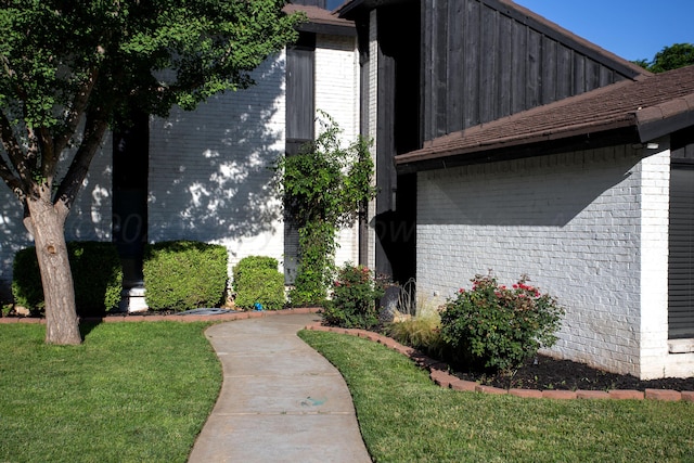 3506 Stromberg Pl, Amarillo, TX 79121 - view of home's exterior featuring brick siding and a lawn