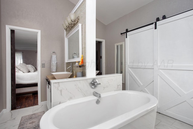 3506 Stromberg Pl, Amarillo, TX 79121 - full bath featuring marble look tile flooring, a freestanding tub, ensuite bath, and vanity