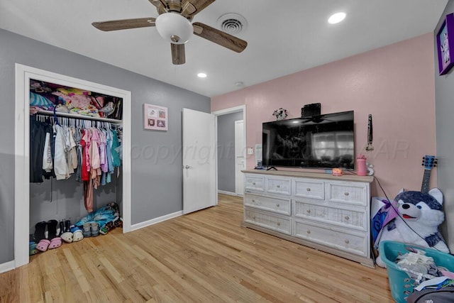 3701 Westlawn Ave, Amarillo, TX 79102 - bedroom with light wood-type flooring, a ceiling fan, a closet, and recessed lighting