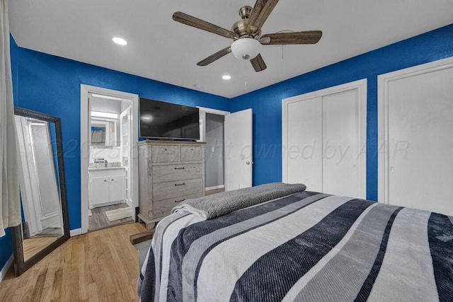 3701 Westlawn Ave, Amarillo, TX 79102 - bedroom with light wood-style floors, ceiling fan, ensuite bathroom, recessed lighting, and multiple closets