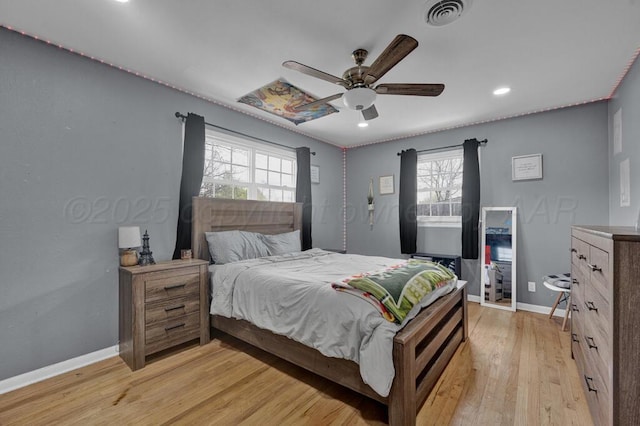 3701 Westlawn Ave, Amarillo, TX 79102 - bedroom with multiple windows, light wood finished floors, recessed lighting, and ceiling fan