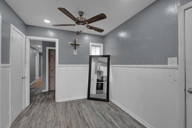 3701 Westlawn Ave, Amarillo, TX 79102 - empty room with wood finished floors and a ceiling fan