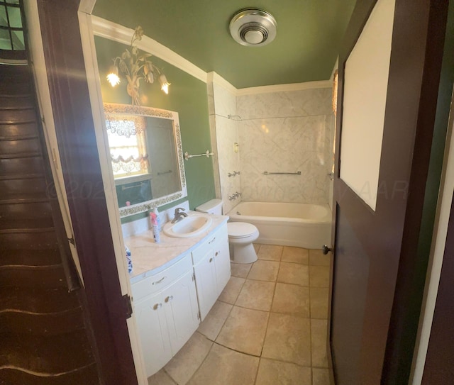 bathroom with tile patterned flooring, vanity, toilet, and shower / bath combination