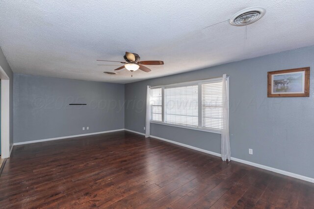 1209 S Main St, Shamrock, TX 79079 - spare room with ceiling fan, wood-type flooring, and a textured ceiling