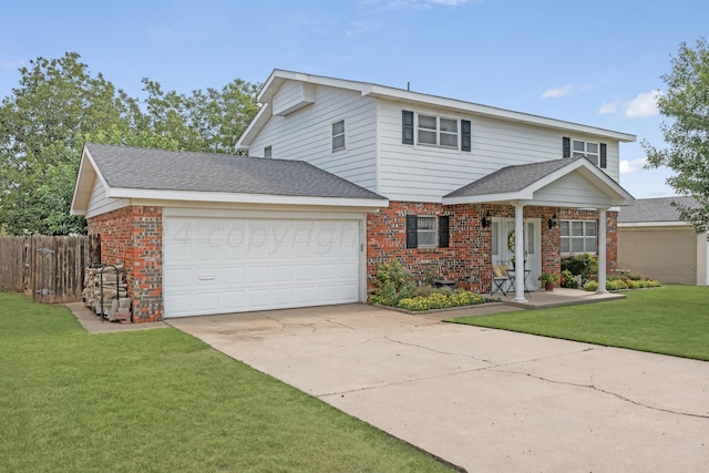 view of front property with a front lawn and a garage