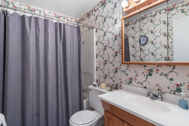 full bathroom featuring toilet, shower / bath combo, and vanity