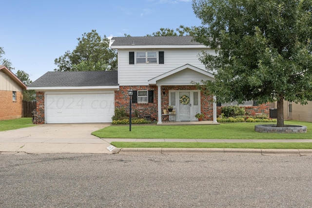 view of front of house featuring a garage and a front yard