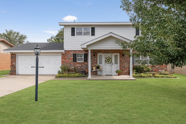 view of front of home featuring covered porch, a garage, and a front lawn