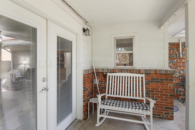 679 Evergreen St, Borger, TX 79007 - property entrance with brick siding and french doors