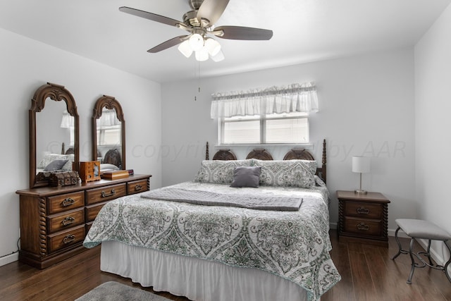 bedroom with ceiling fan and dark hardwood / wood-style flooring