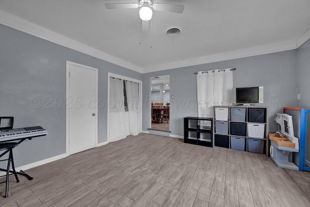 3412 Sunlite St, Amarillo, TX 79109 - game room with wood finished floors, ornamental molding, and a ceiling fan