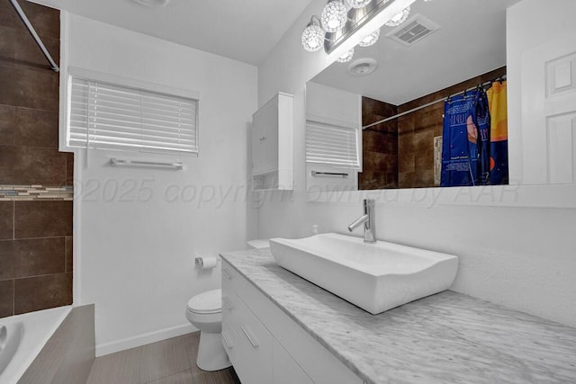 3412 Sunlite St, Amarillo, TX 79109 - full bathroom featuring vanity and shower / bath combo