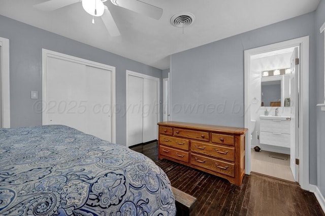 3412 Sunlite St, Amarillo, TX 79109 - bedroom with dark wood-type flooring, two closets, ensuite bath, and ceiling fan