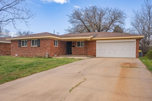 3412 Sunlite St, Amarillo, TX 79109 - single story home featuring brick siding, driveway, a garage, and a front yard