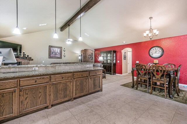 9315 Shylana Ave, Amarillo, TX 79119 - kitchen with a chandelier, decorative light fixtures, arched walkways, and open floor plan
