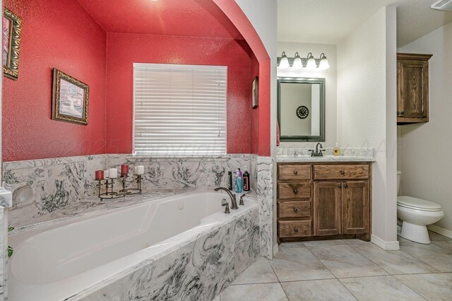 9315 Shylana Ave, Amarillo, TX 79119 - bathroom featuring vanity, a garden tub, toilet, and tile patterned flooring