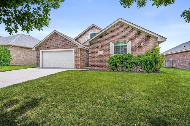 9315 Shylana Ave, Amarillo, TX 79119 - traditional-style home with brick siding, an attached garage, and concrete driveway