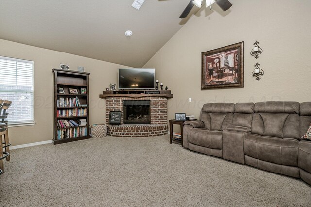 9315 Shylana Ave, Amarillo, TX 79119 - living room with a brick fireplace, ceiling fan, carpet flooring, vaulted ceiling, and baseboards