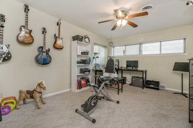 2229 Charles St, Pampa, TX 79065 - workout area with a ceiling fan, healthy amount of natural light, and carpet flooring