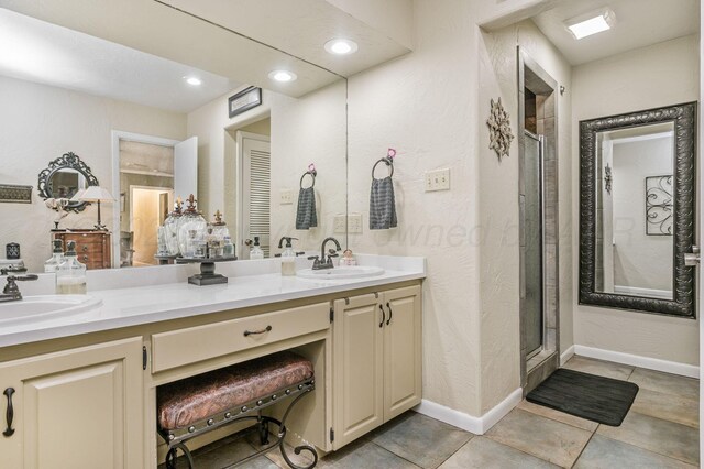 2229 Charles St, Pampa, TX 79065 - full bath featuring a stall shower, double vanity, recessed lighting, and tile patterned floors