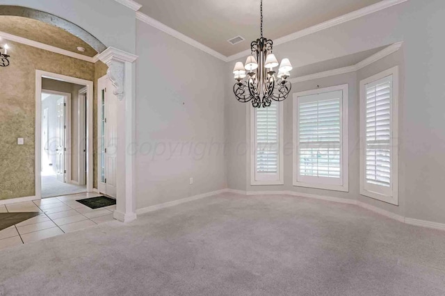 7802 Pineridge Dr, Amarillo, TX 79119 - carpeted empty room with a chandelier, baseboards, crown molding, and tile patterned flooring