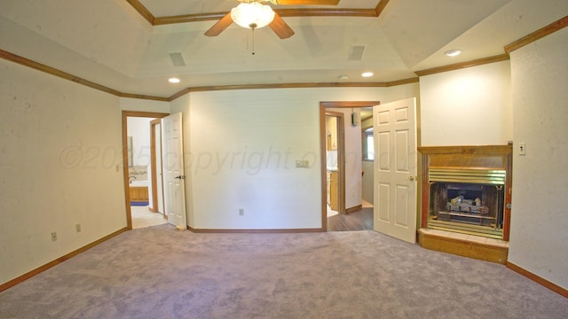 8107 Progress Dr, Amarillo, TX 79119 - unfurnished living room with ornamental molding, ceiling fan, carpet, lofted ceiling, and a fireplace with raised hearth