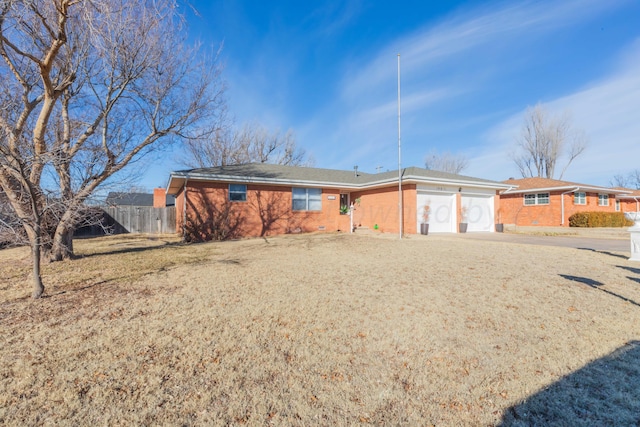 single story home featuring a garage