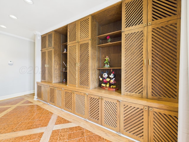 details with baseboards, recessed lighting, and crown molding