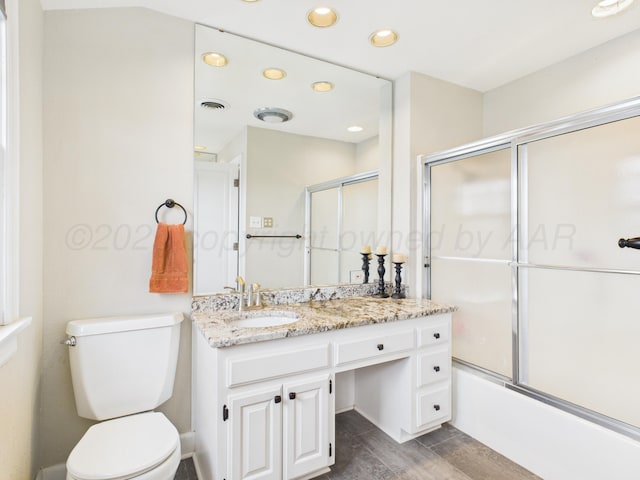 full bath with recessed lighting, wood finished floors, toilet, vanity, and visible vents