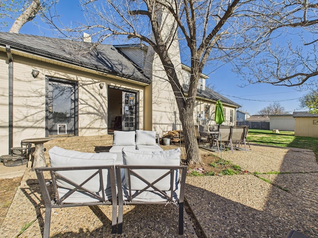 view of patio / terrace with fence, outdoor dining space, and outdoor lounge area