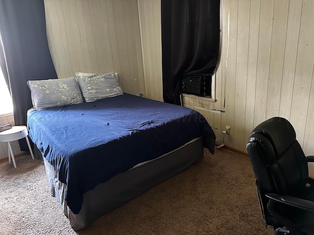 206 Dolomita St, Borger, TX 79007 - bedroom featuring carpet flooring and wood walls
