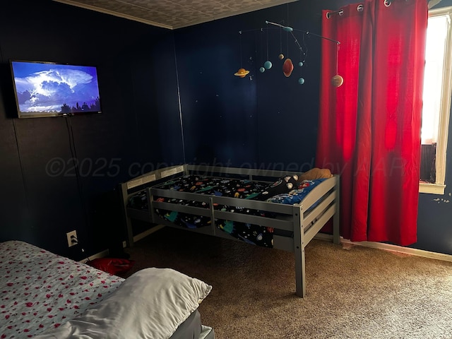 206 Dolomita St, Borger, TX 79007 - carpeted bedroom featuring baseboards