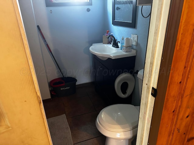 206 Dolomita St, Borger, TX 79007 - half bathroom with tile patterned flooring and vanity