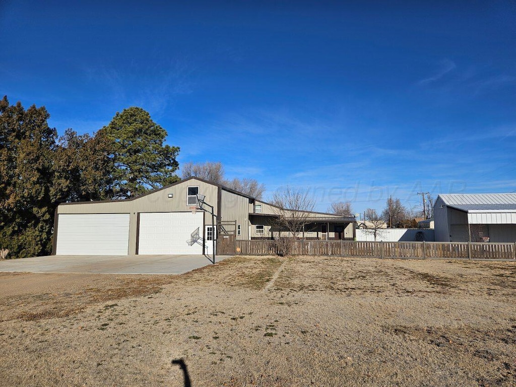 view of side of home with a garage