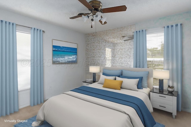 1338 Haggard St, Borger, TX 79007 - bedroom featuring light colored carpet and a ceiling fan