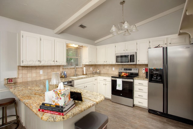7133 Birkshire Dr, Amarillo, TX 79109 - kitchen with stainless steel appliances, a sink, light stone countertops, backsplash, and a chandelier