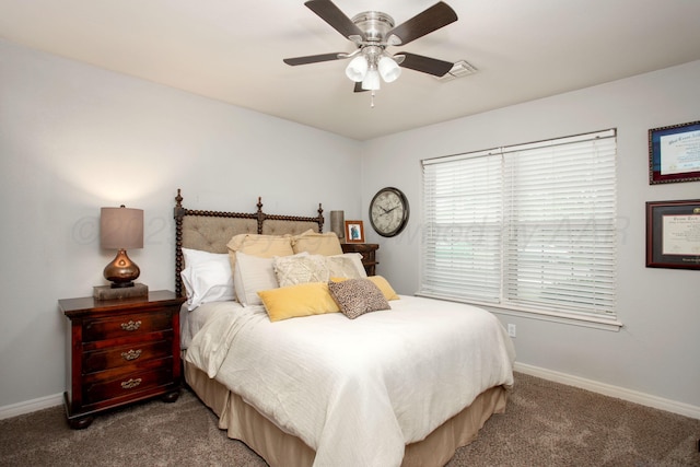 7133 Birkshire Dr, Amarillo, TX 79109 - carpeted bedroom with baseboards and a ceiling fan
